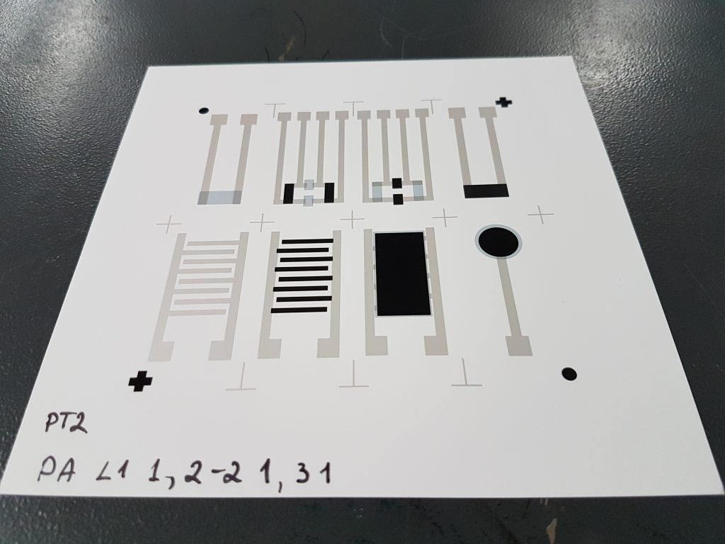 Silver, Carbon, and PEDOT:PSS layers printed onto synthetic paper